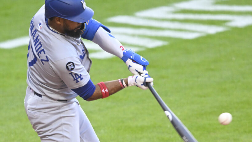 Los Angeles Dodgers right fielder Teoscar Hernandez swinging at a pitch
