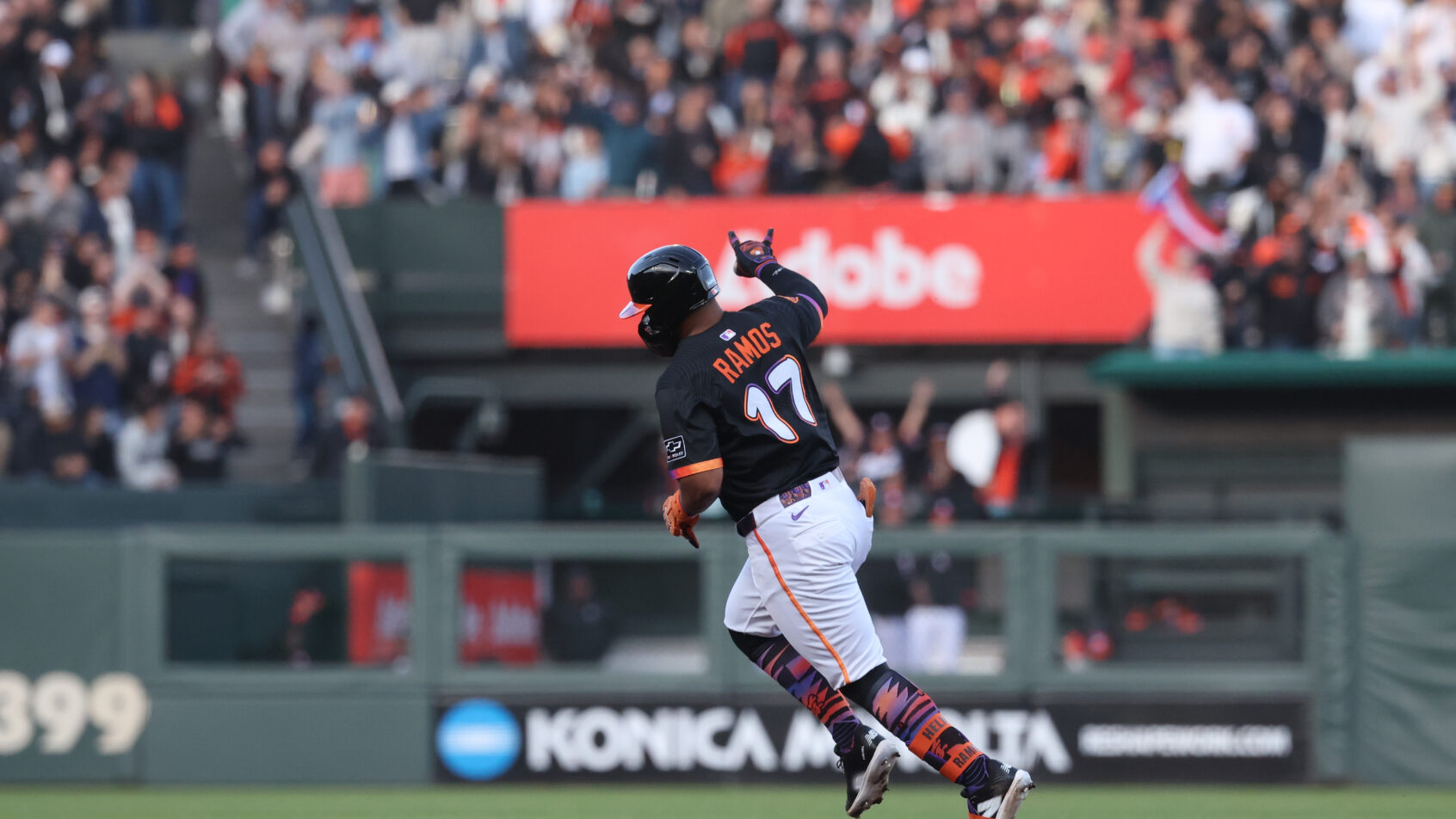 Heliot Ramos rounds the bases after hitting a home run