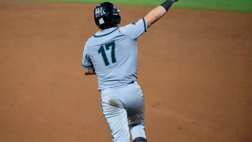 Caden Bodine running the bases after hitting a home run