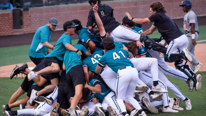 Coastal Carolina dogpiles after beating Auburn