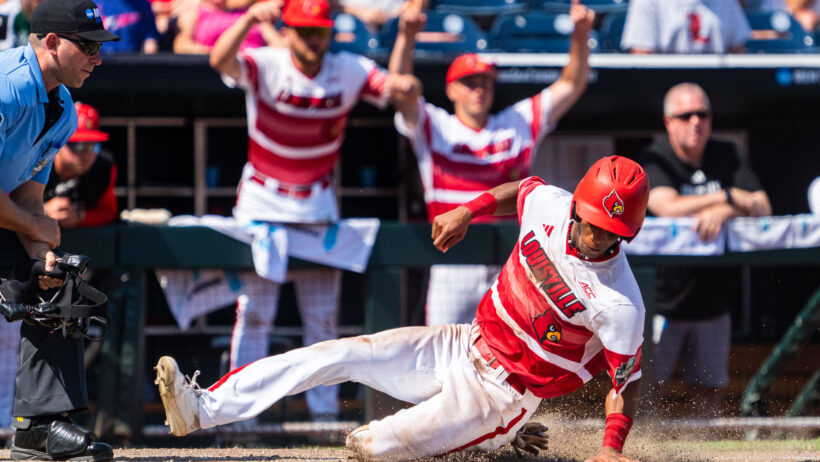 Louisville's Kamau Neighbors slides safely into home versus Arizona.
