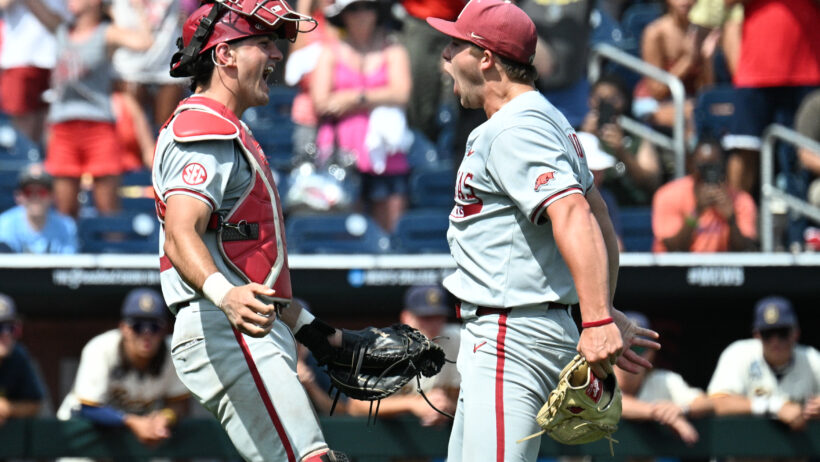 Arkansas Razorbacks starting pitcher Gage Wood celebrates his no-hitter with catcher Ryder Helfrick