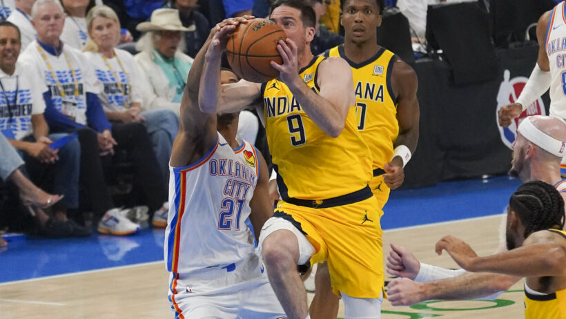 Indiana Pacers guard T.J. McConnell goes up for a shot as Oklahoma City Thunder guard Aaron Wiggins defends