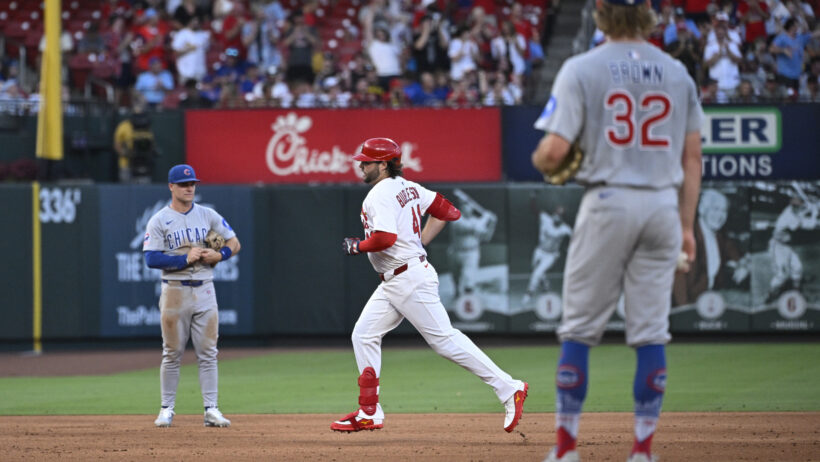 Alec Burleson rounding the bases after hitting a home run vs the Cubs