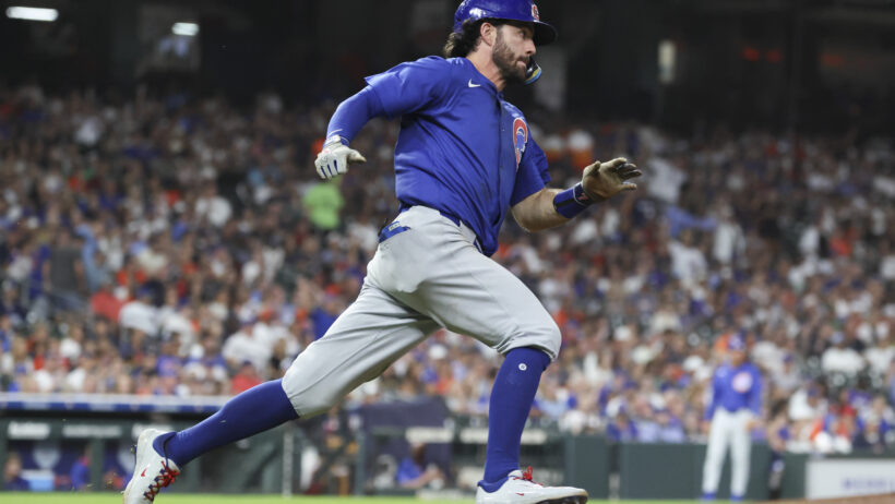 Chicago Cubs shortstop Dansby Swanson running the bases