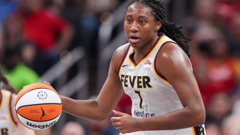 Indiana Fever forward Aliyah Boston brings the ball up the court