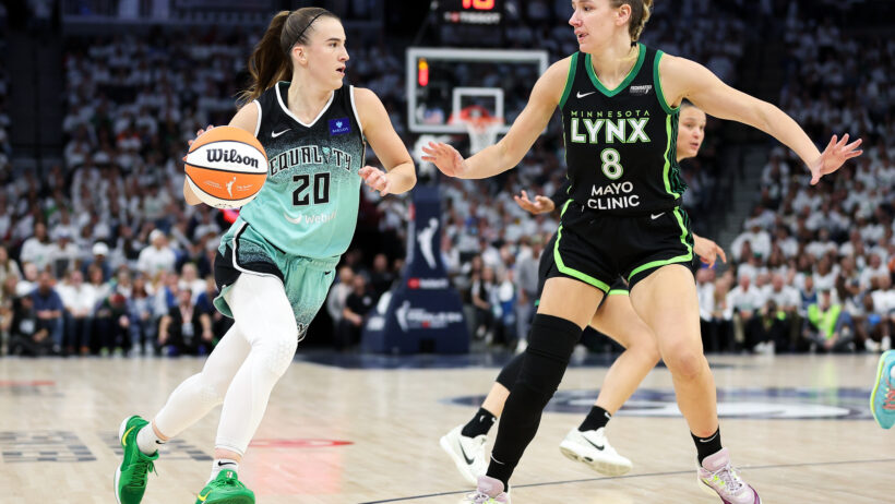 New York Liberty guard Sabrina Ionescu tries to drive past Minnesota Lynx forward Alanna Smith