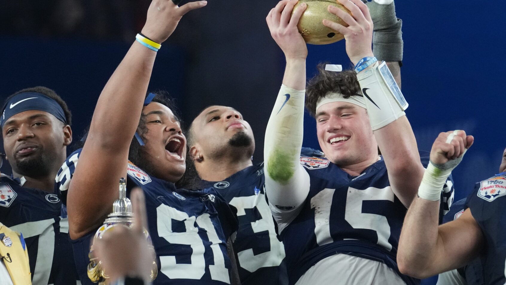 Penn State Nittany Lions teammates Drew Allar and Dvon J-Thomas celebrate
