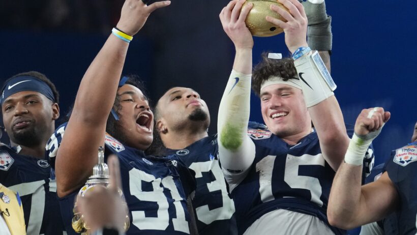 Penn State Nittany Lions teammates Drew Allar and Dvon J-Thomas celebrate