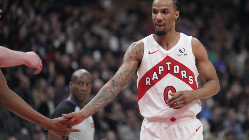 Toronto Raptors guard AJ Lawson gets congratulated after making a basket