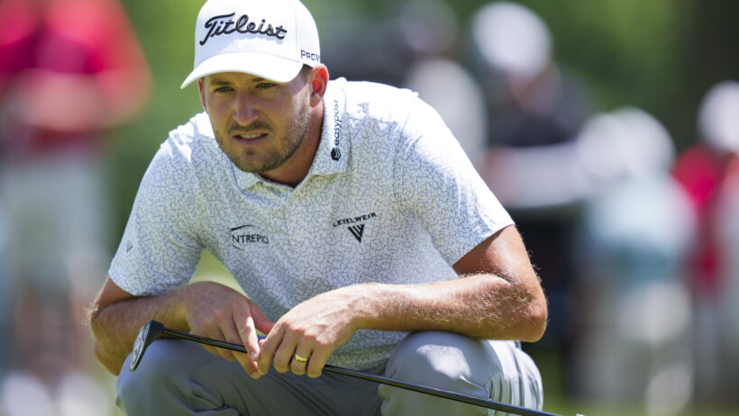 Lee Hodges reads a putt at the John Deere Classic.