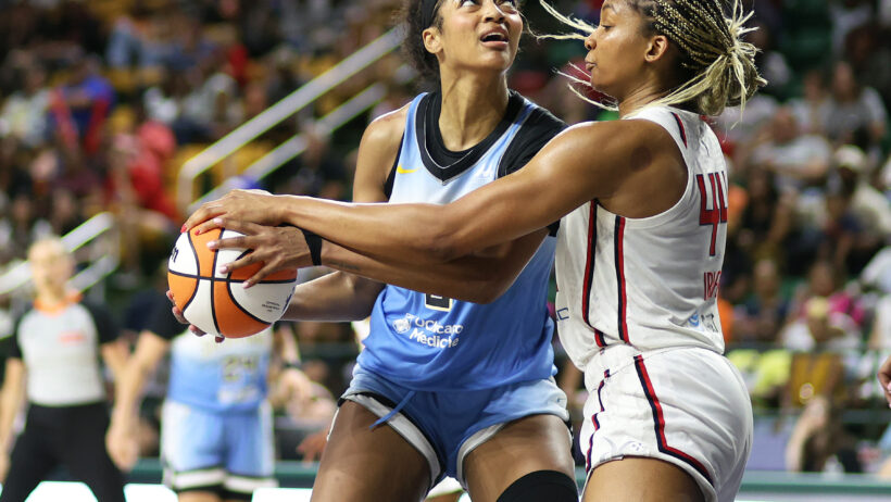 Chicago Sky forward Angel Reese battles in the post with Washington Mystics forward Kiki Iriafen