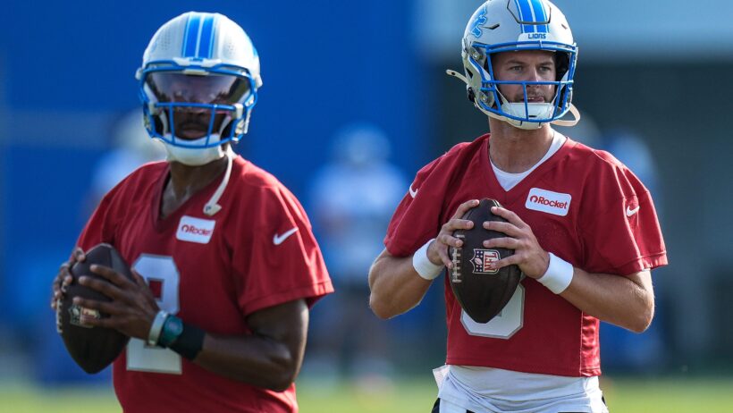 Detroit Lions quarterbacks Hendon Hooker and Kyle Allen on the field at training camp