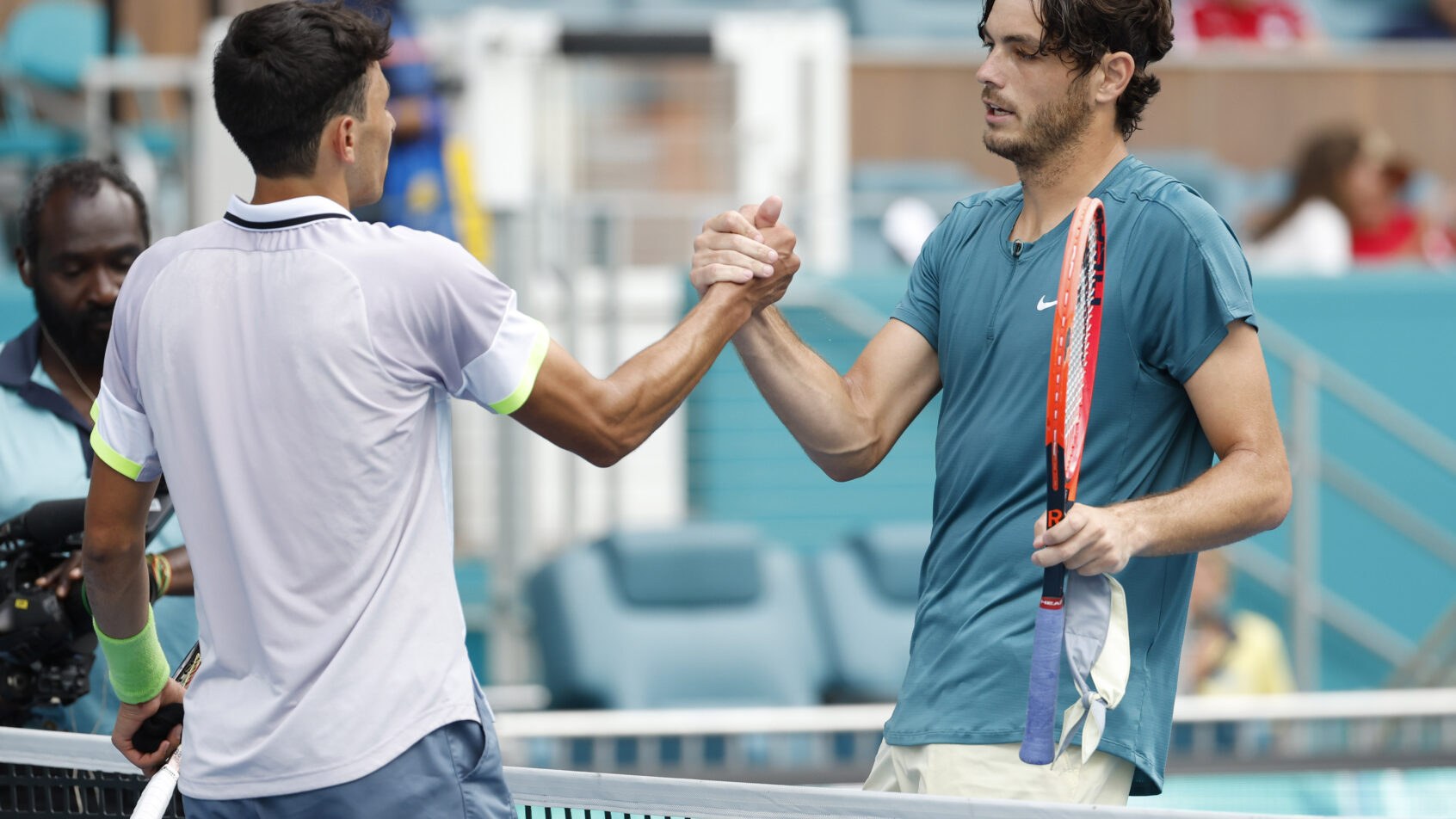 Taylor Fritz and Emilio Nava shaking hands after a match