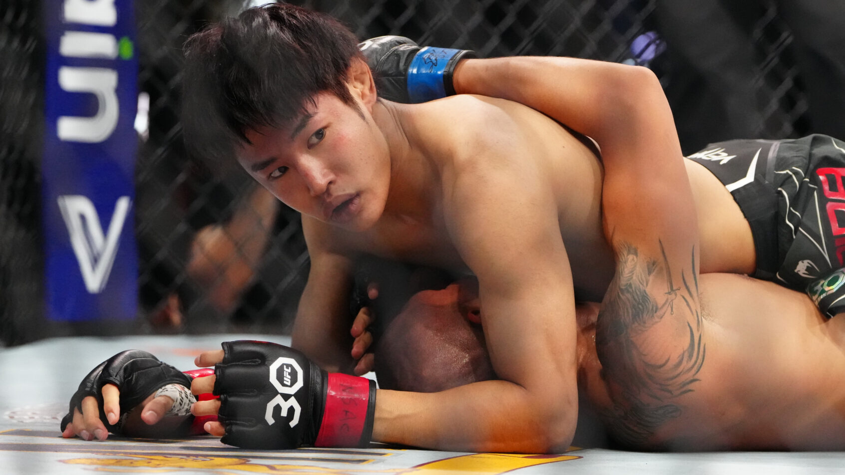Tatsuro Taira in a bout with Edgar Chairez from UFC 290.