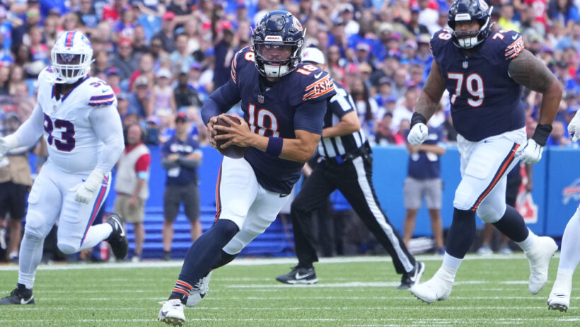 Chicago Bears quarterback Caleb Williams runs with the ball against the Buffalo Bills
