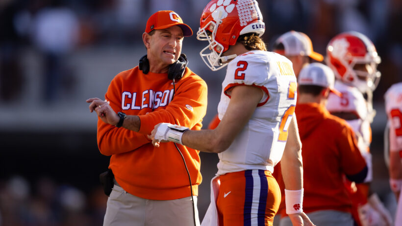 Dabo Swinney and Cade Klubnik talk things over.