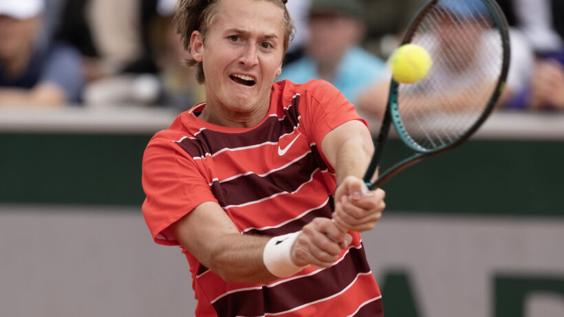 Sebastian Korda hitting a backhand