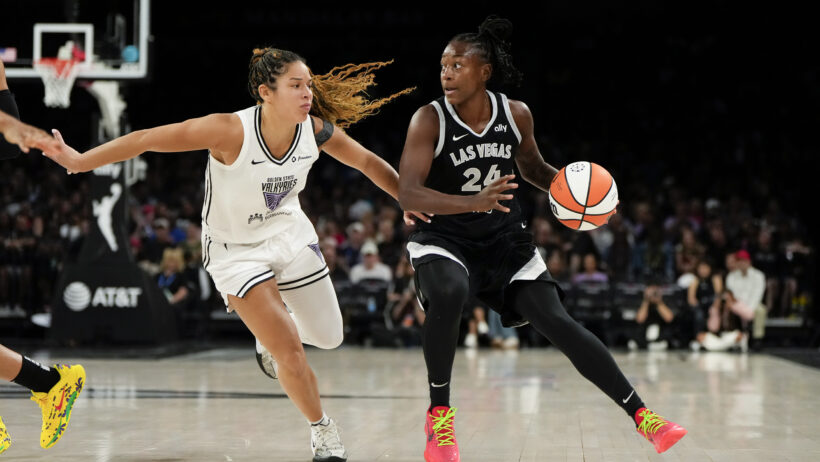 Las Vegas Aces guard Jewell Loyd looks to pass as Golden State Valkyries guard Veronica Burton defends
