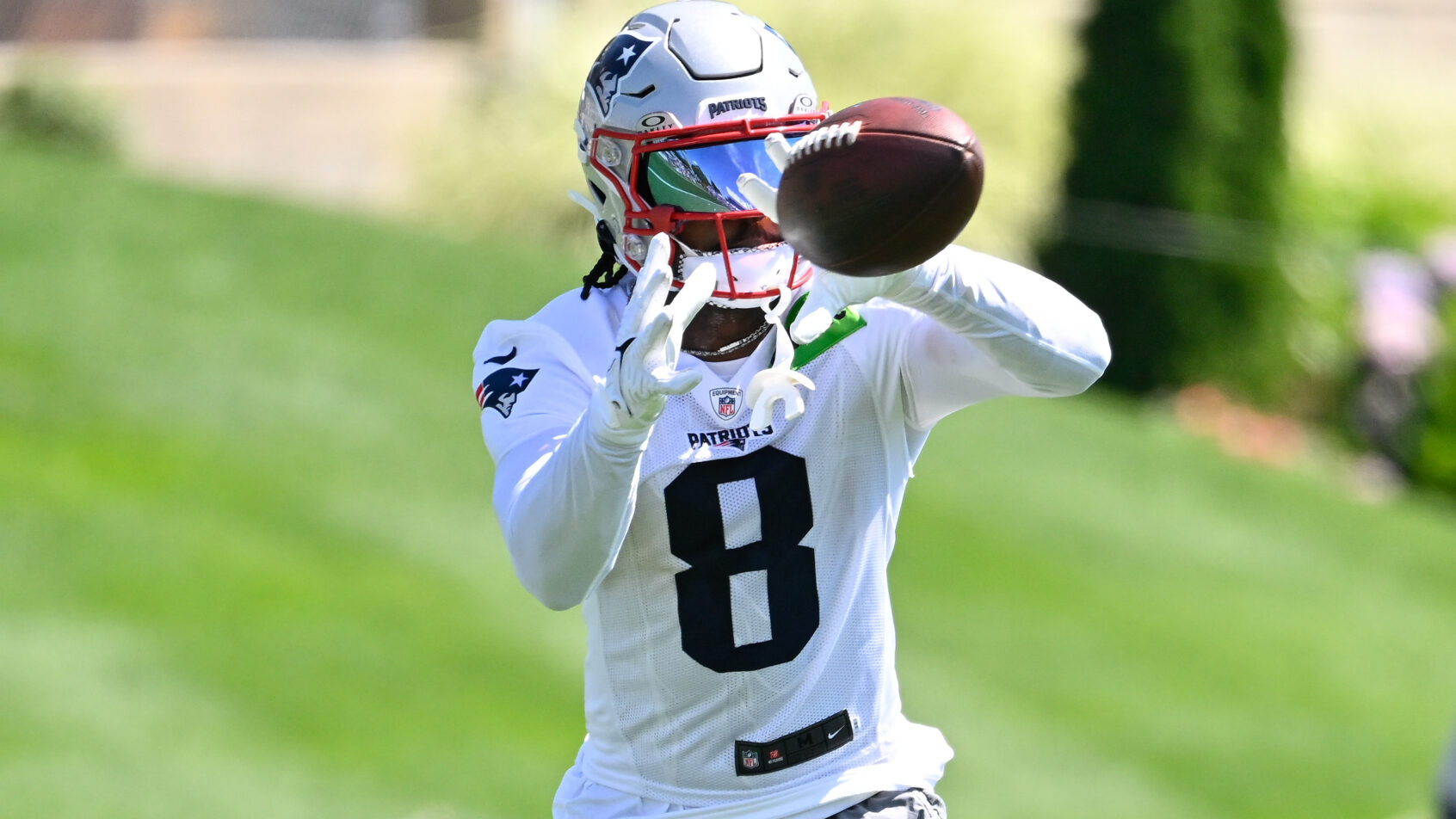 New England Patriots wide receiver Stefon Diggs catching a pass during training camp