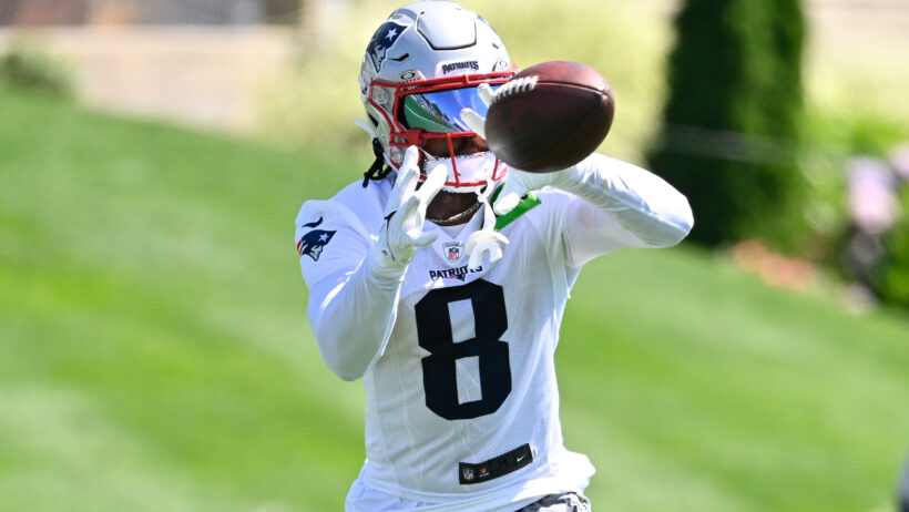 New England Patriots wide receiver Stefon Diggs catching a pass during training camp