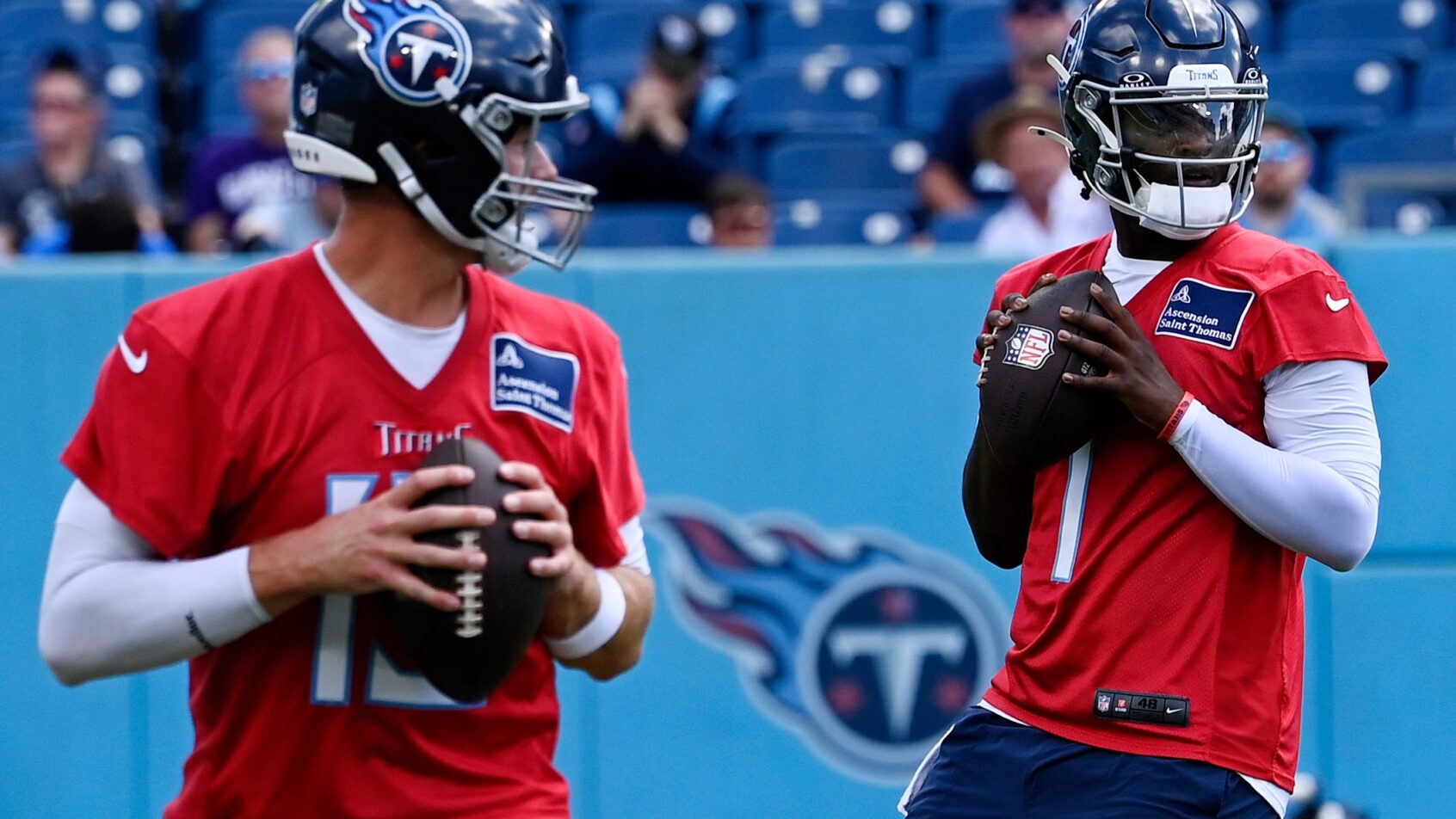 Tennessee Titans quarterbacks Tim Boyle and Cam Ward practicing