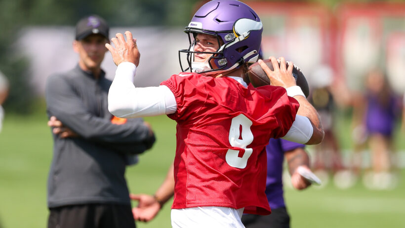 J.J. McCarthy throws pass in training camp
