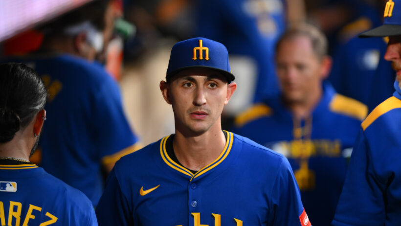 Seattle Mariners starting pitcher George Kirby in the dugout