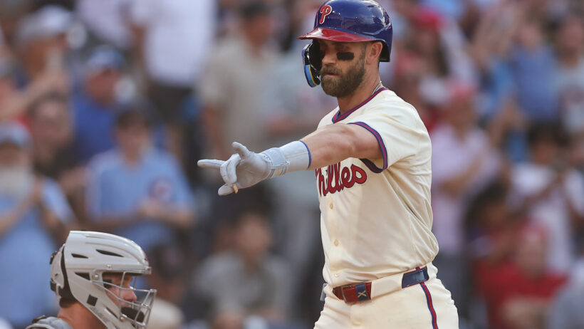 Philadelphia Phillies first base Bryce Harper crosses home plate after hitting a homer against the Detroit Tigers