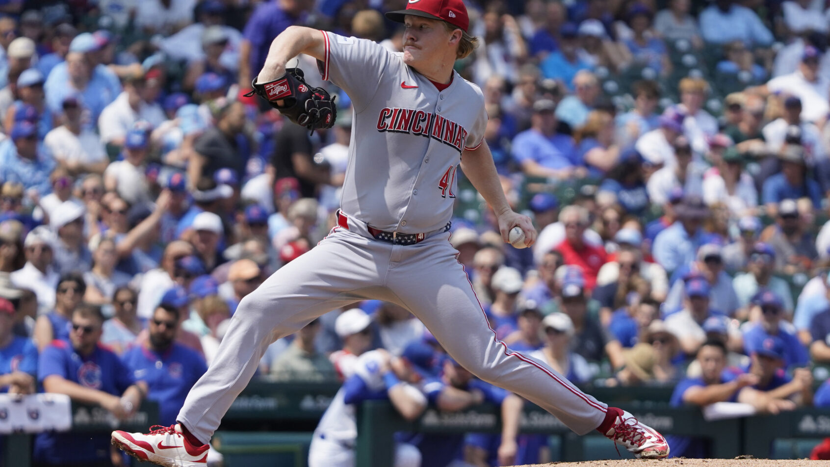 Cincinnati Reds pitcher Andrew Abbott throwing a pitch