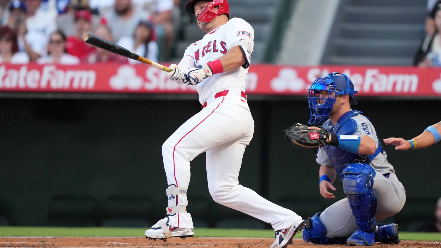 LA Angels designated hitter Mike Trout hitting a single against the LA Dodgers