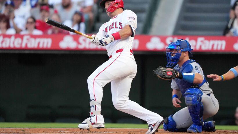 LA Angels designated hitter Mike Trout hitting a single against the LA Dodgers