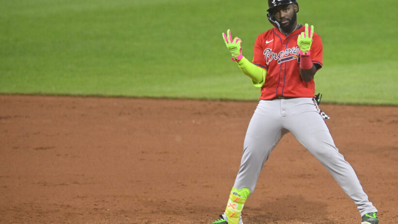 Michael Harris celebrates after a hit