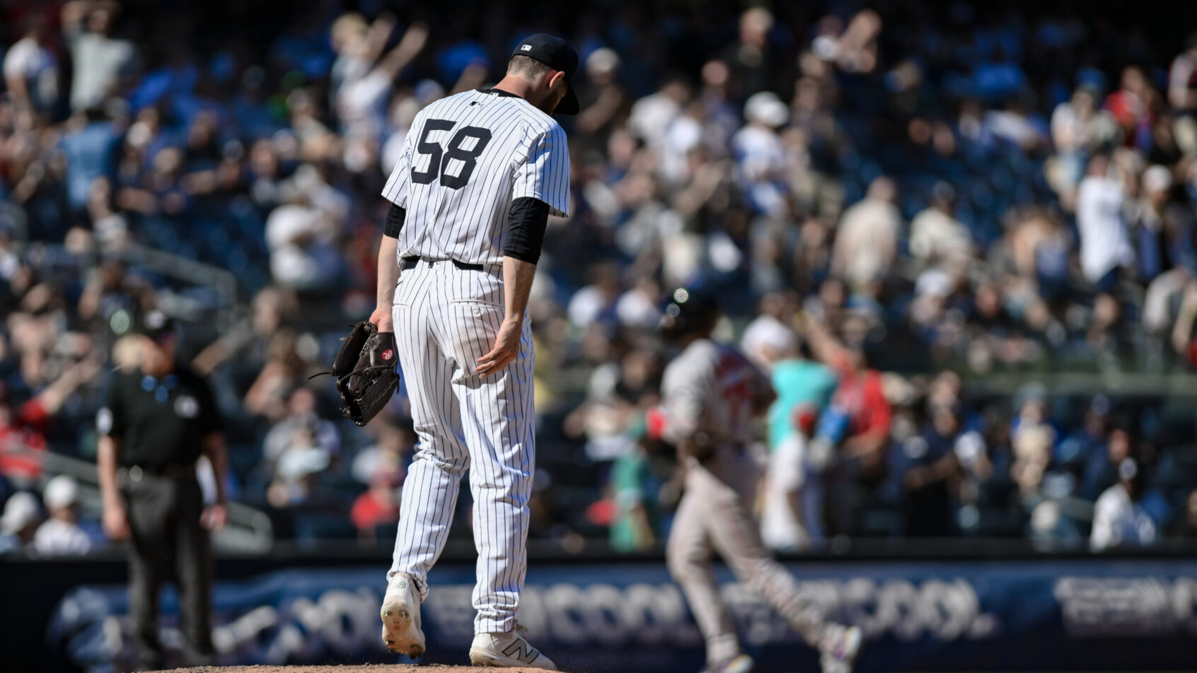 New York Yankees pitcher Paul Blackburn looks down after giving up a home run to Boston Red Sox catcher Carlos Narváez