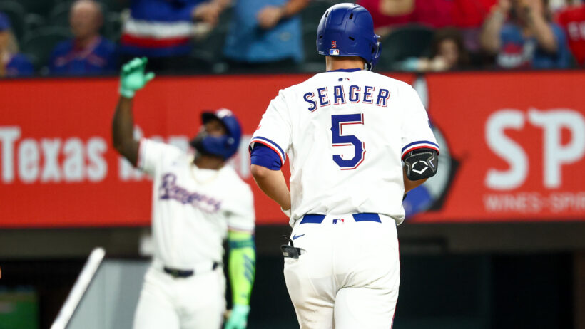Corey Seager rounds the bases after hitting a home run