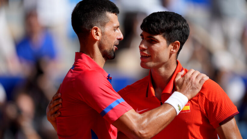 Novak Djokovic and Carlos Alcaraz congratulate each other after the 2024 Olympic gold-medal match