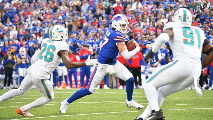 Buffalo Bills quarterback Josh Allen runs with the ball against the Miami Dolphins
