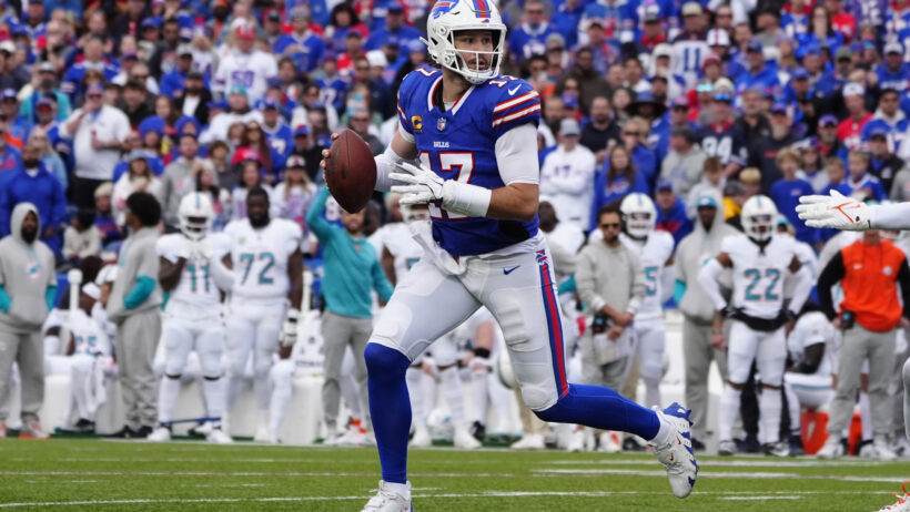 Buffalo Bills quarterback Josh Allen runs with the ball against the Miami Dolphins