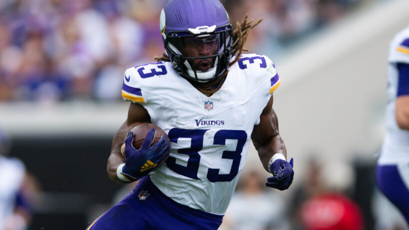 Minnesota Vikings running back Aaron Jones Sr carrying the ball