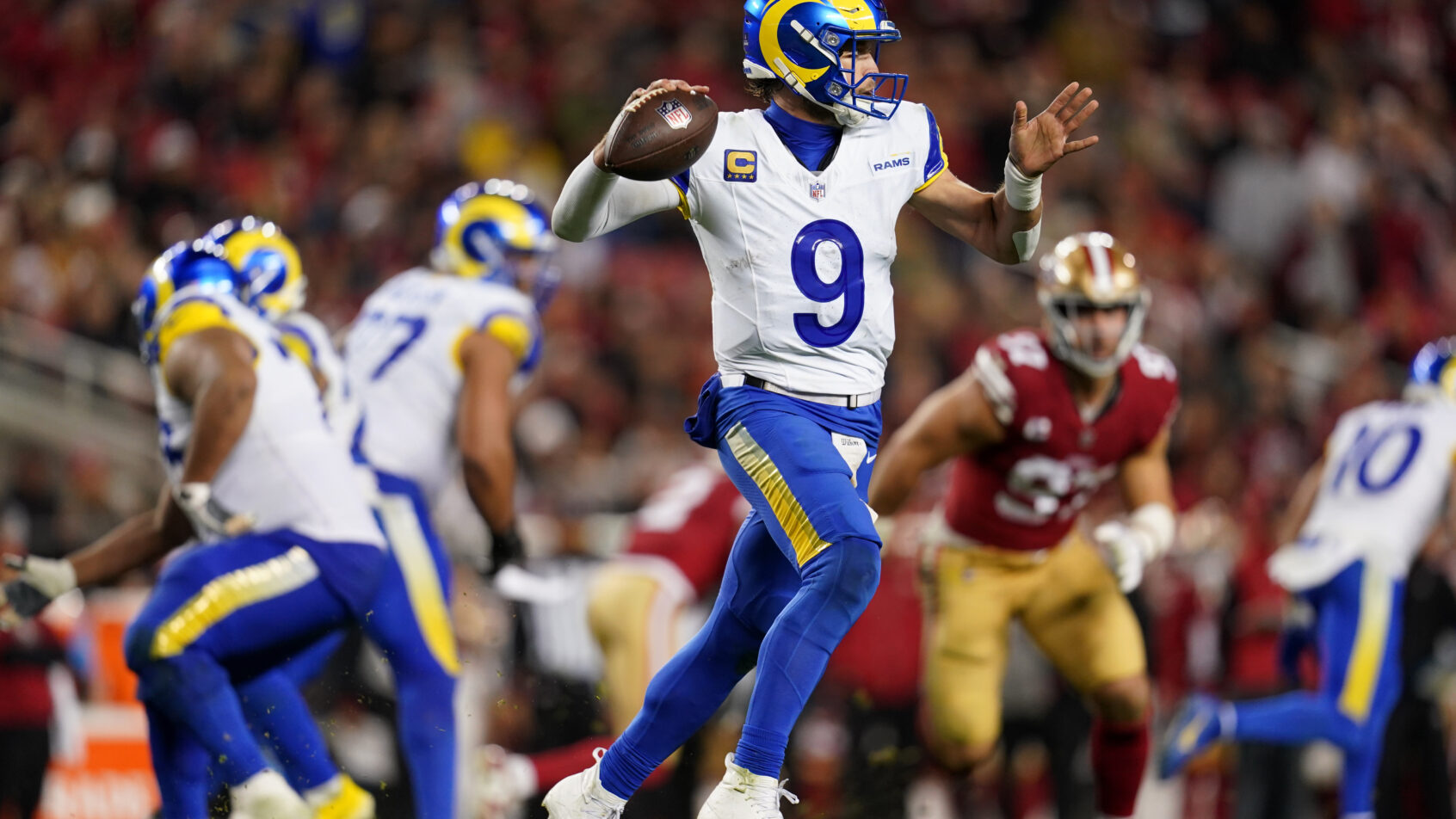 Los Angeles Rams quarterback Matthew Stafford throwing a pass against the San Francisco 49ers