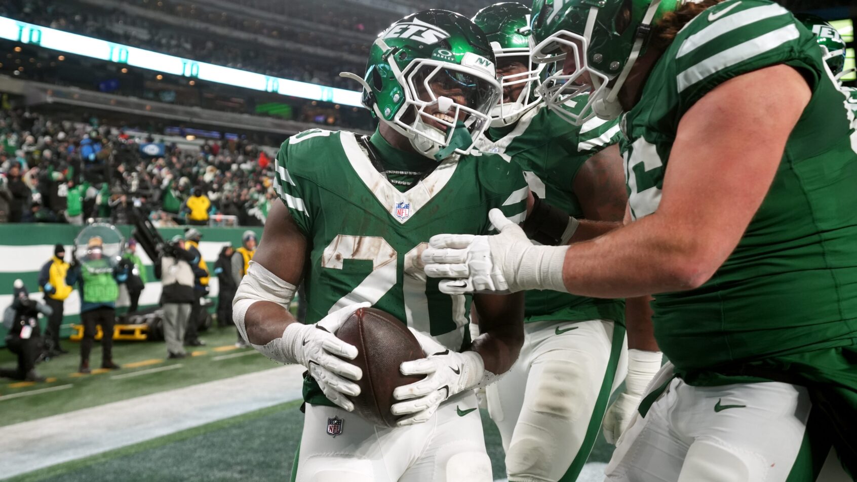 New York Jets running back Breece Hall celebrates a TD against the Miami Dolphins in 2024