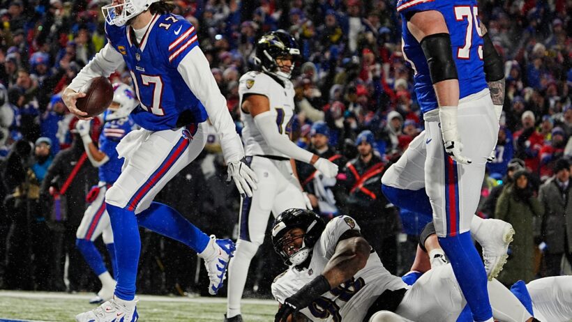 Buffalo Bills QB Josh Allen scoring a rushing touchdown against the Baltimore Ravens