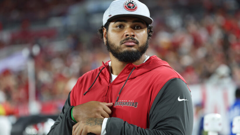 Tampa Bay Buccaneers offensive tackle Tristan Wirfs on the sideline injured