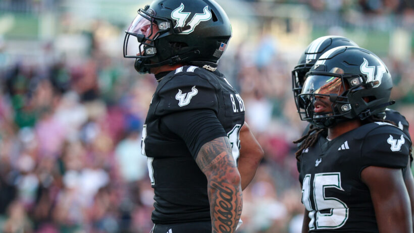 Byrum Brown celebrates a TD run against Boise State in Week 1.