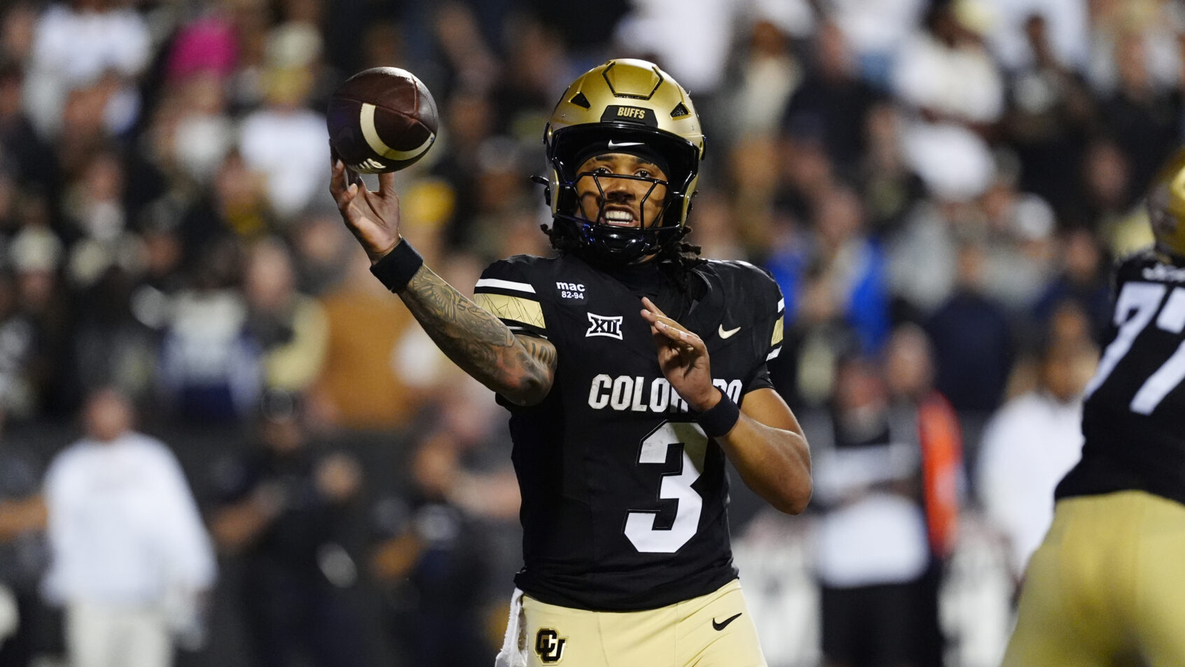 Colorado Buffaloes quarterback Kaidon Salter passes the ball