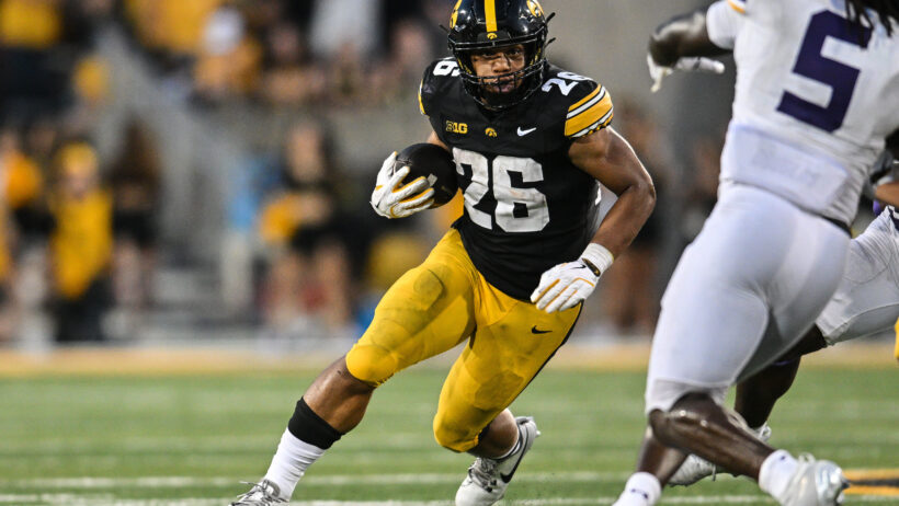 Iowa Hawkeyes running back Xavier Williams runs the ball
