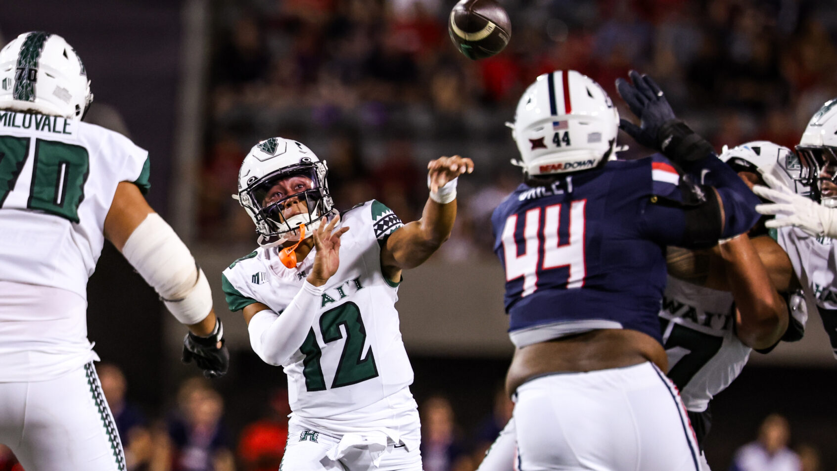 Micah Alejado throwing pass