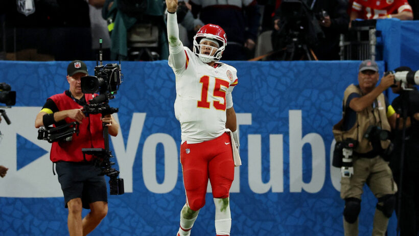 Kansas City Chiefs quarterback Patrick Mahomes gestures to the crowd