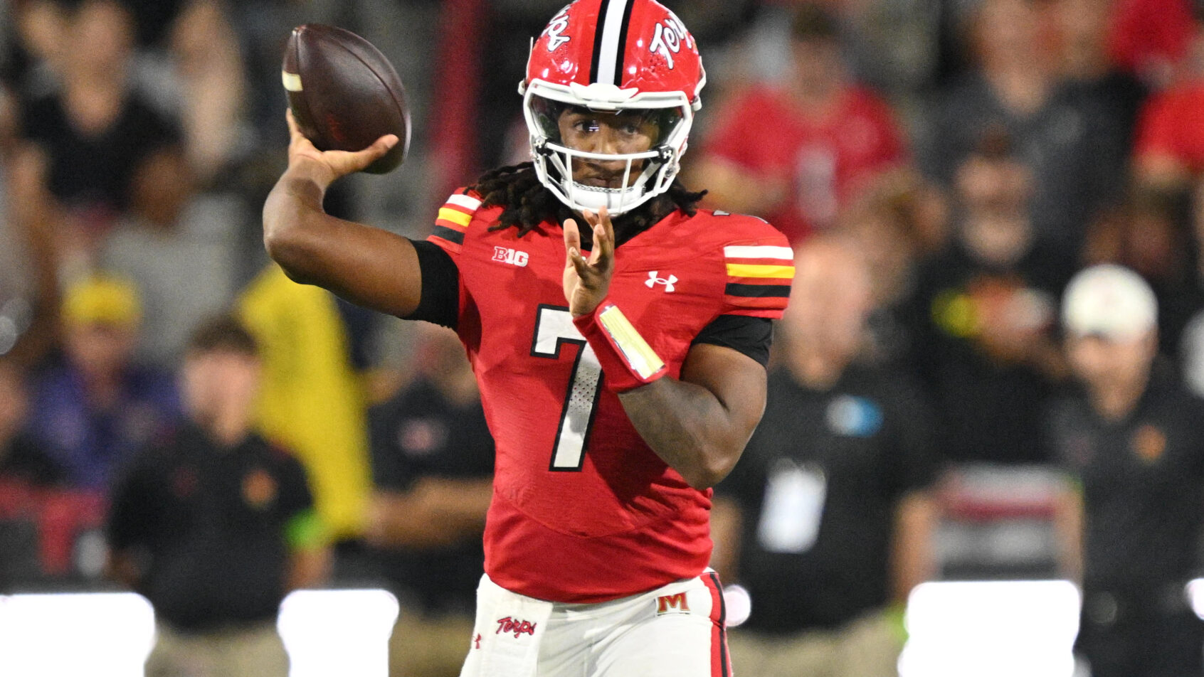 Maryland Terrapins quarterback Malik Washington passes