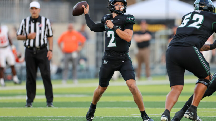 Hawaii Rainbow Warriors quarterback Luke Weaver makes a pass